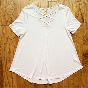 White tunic top with intricate neckline